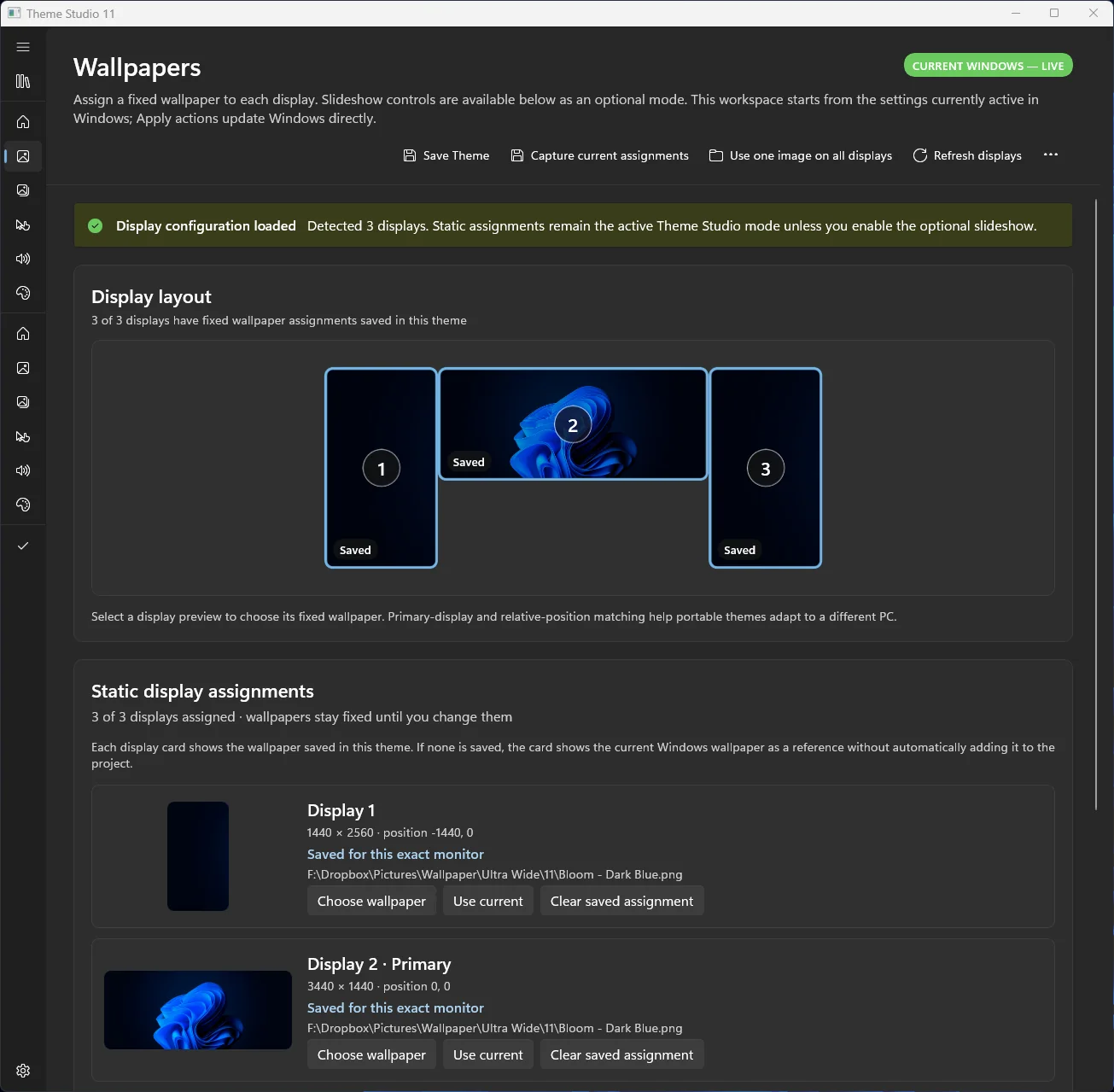 Theme Studio 11 showing current Windows wallpaper assignments across three displays