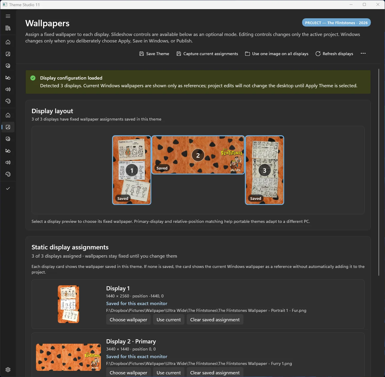 Theme Studio 11 project wallpaper editor showing separate assignments for three displays